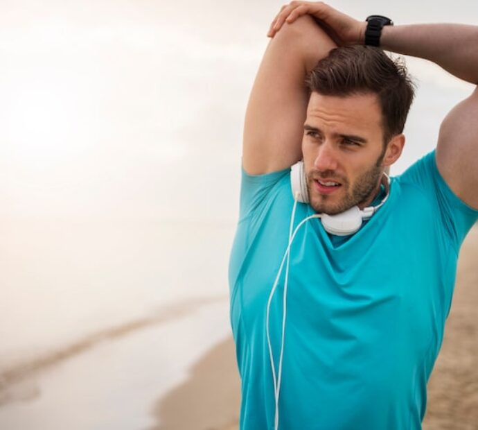 close-up-young-fit-person-jogging-by-sea_329181-16792